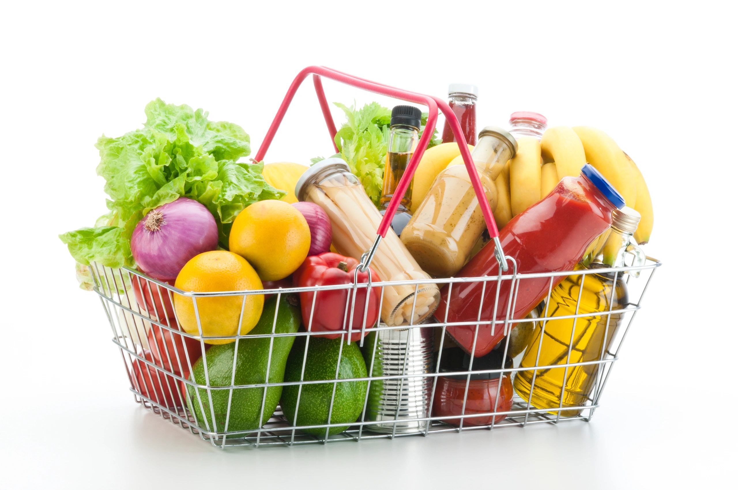 Wire basket filled with groceries and vegetables
