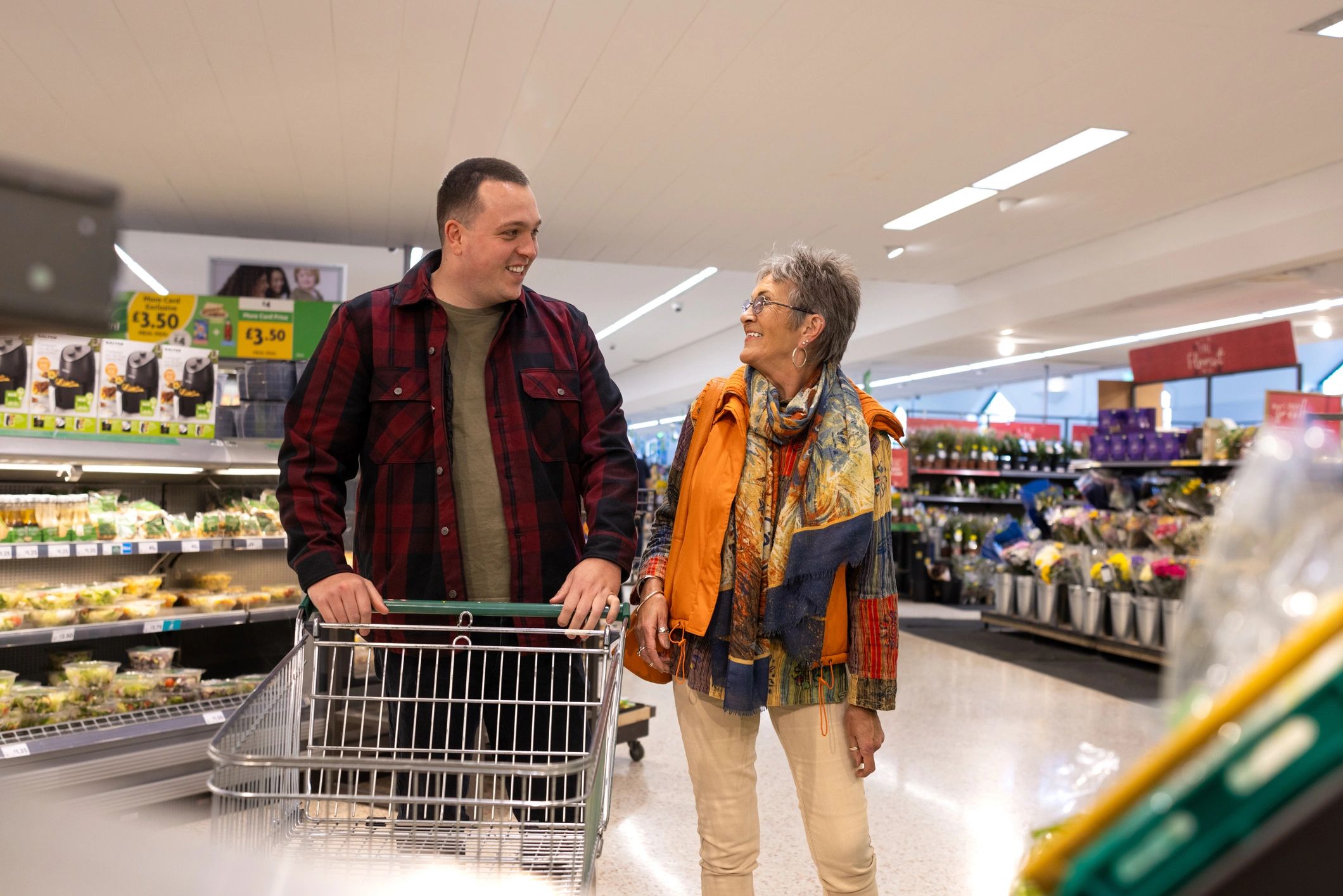 Family members shopping together in a supermarket