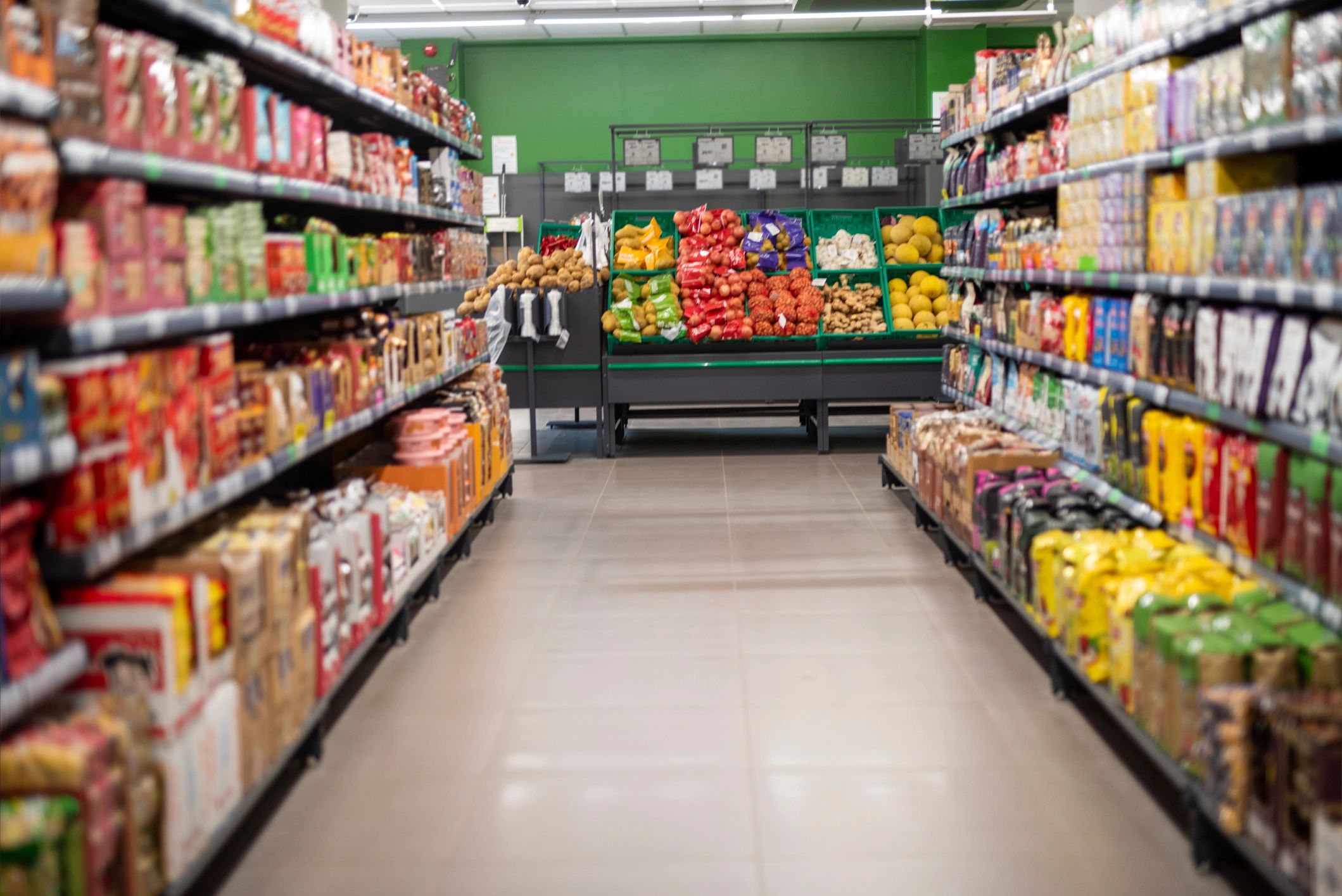 Supermarket aisle with fresh produce